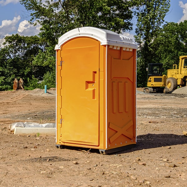 how often are the portable restrooms cleaned and serviced during a rental period in Le Roy IA